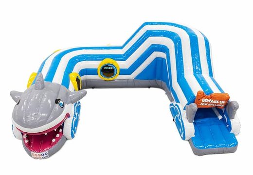 Buy an inflatable shark bouncy castle with obstacles, a climbing ramp and sliding ramp for children. Order bouncy castles online at JB Inflatables UK