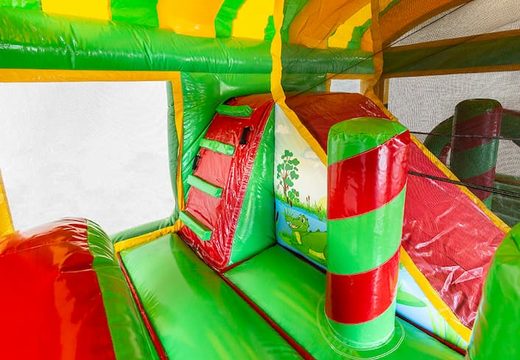 Inflatable multiplay crocodile bouncy castle with a slide in the middle and buy 3D objects for children. Order bouncy castles online at JB Inflatables UK