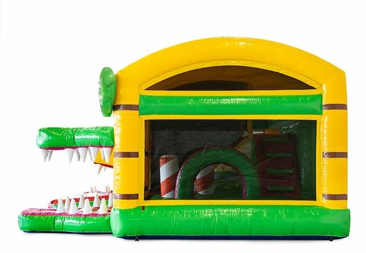 Inflatable multiplay Jungleworld bouncy castle with a slide in the middle and 3D objects for children. Order bouncy castles online at JB Inflatables UK