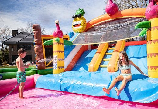 Order a bouncer with water slide for your garden in the flamingo theme for children. Buy bouncers online at JB Inflatables UK
