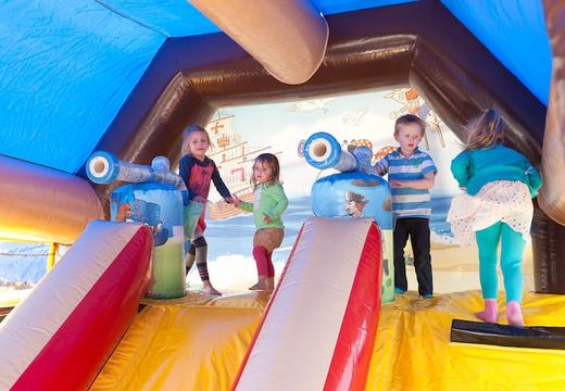 Order shooting combo pirate bouncy castle covered, with cannon game and slide for kids. Buy inflatable bouncy castles online at JB Inflatables UK