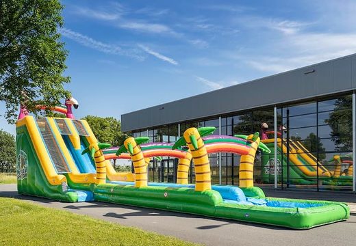 Buy Drop & Slide Jungle bouncy castle with double slide for kids. Order inflatable bouncy castles online at JB Inflatables UK