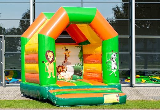 Midi inflatable bouncer in a colour combination of green yellow and orange in jungle theme for kids to buy. Order bouncers online at JB Inflatables UK 