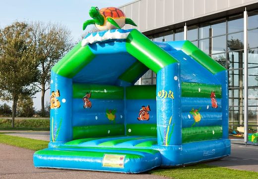 Buy unique standard bouncy castles with a 3D turtle object on the top for kids. Buy bouncy castles online at JB Inflatables UK