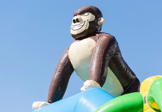 Order a standard jungle bouncy castle in striking colors with a large 3D object in the shape of a gorilla on the top for children. Bouncy castle for sale online at JB Inflatables UK