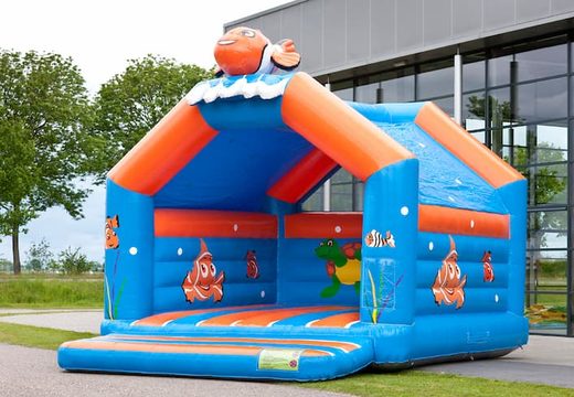 Super bouncy castle with roof in clownfish nemo theme for kids. Buy bouncy castles online at JB Inflatables UK