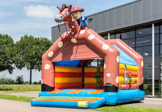 Buy big bouncers with roof in cowboy theme for kids. Order bouncers online at JB Inflatables UK