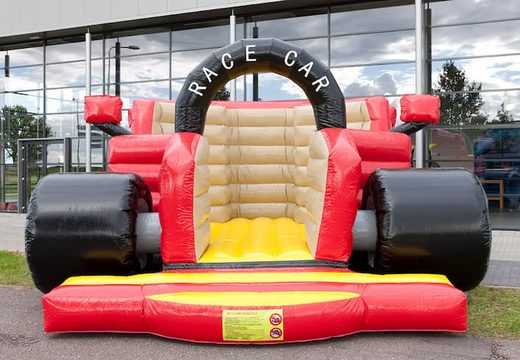 Buy F1 car super bouncer in the colours black red brown and yellow for children.  Order bouncers online at JB Inflatables UK