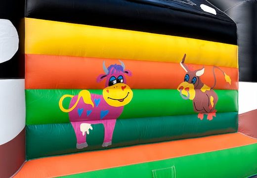 Buy a super bouncy castle covered in a cow theme for kids. Order bouncy castles at JB Inflatables UK online