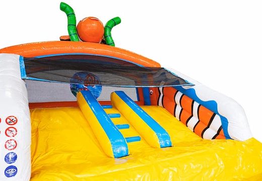 Waterslide bouncy castle in seaworld theme with a 3D object from nemo on top at JB Inflatables UK. Buy bouncy castles online now at JB Inflatables UK