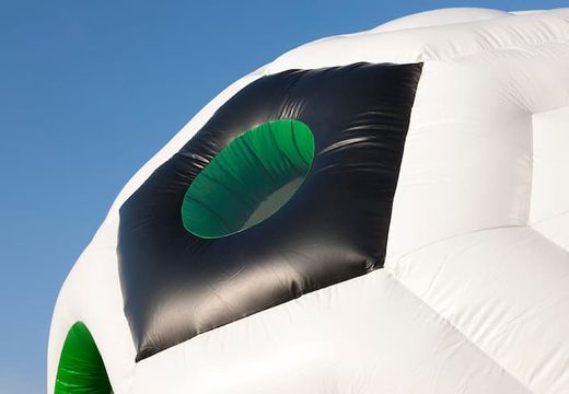 Football super bouncy castle  in the colours green black and white for kids.  Buy bouncy castle  online at JB Inflatables UK