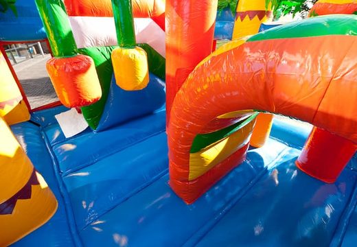 Bouncer in beach theme with a slide for children. Buy inflatable bouncers online at JB Inflatables UK