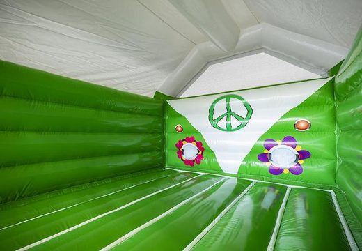 Buy inflatable bouncy castle in green with hippy style for children