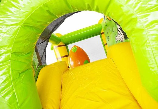 Compact inflatable air cushion in dino theme including slide for children