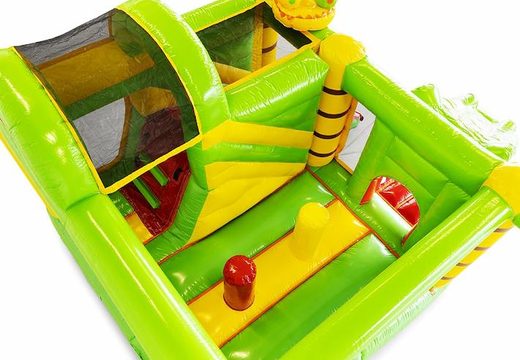 Order a small inflatable bouncy castle with obstacles and slide in dino theme