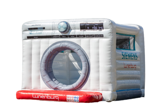 Custom made bouncy castle in the shape of a washing machine from Siemens as an eye-catcher promotion means