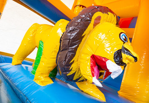 Order inflatable bouncy castle with slide and roof in Amazon safari theme for children