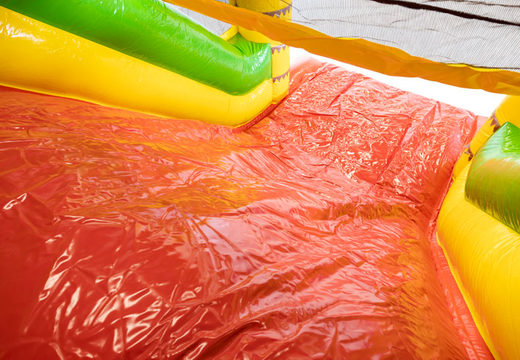 Obstacle course 13m long in theme Jungle for children. Buy inflatable obstacle courses now online at JB Inflatables UK