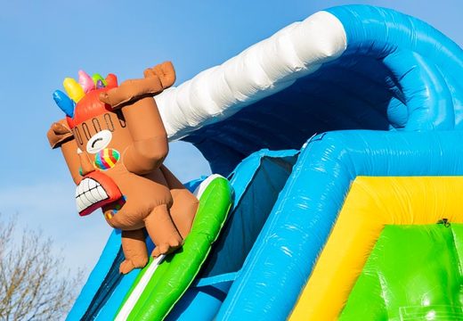 Inflatable slide in  Hawaii theme for kids. Order inflatable Drop and Slide now online at JB Inflatables UK