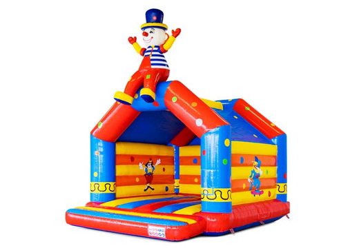 Red, blue, yellow and circus theme with clown bouncy castle