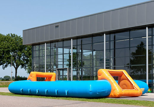 Get blue orange inflatable table football with unique boarding sliding system online now. Order inflatable table football at JB Inflatables Netherlands