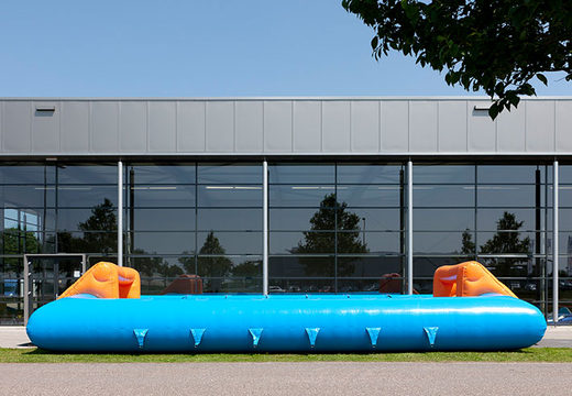 Buy blue orange inflatable table football with unique boarding slide system for kids. Order inflatable table football now online at JB Inflatables Netherlands