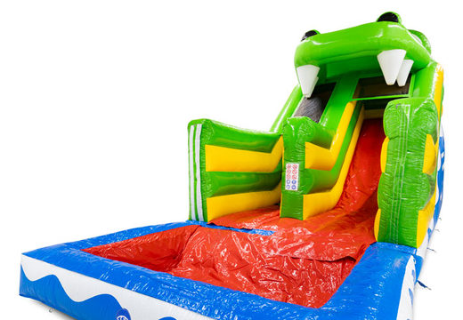 Front view of multiplay 4 in 1 bouncy castle slide in crocodile theme