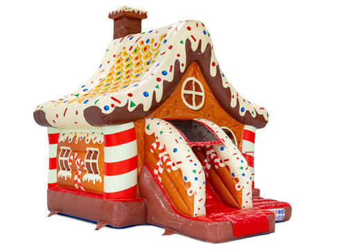Side of Gingerbread house with candy winter theme inflatable bouncy castle