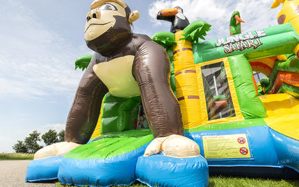 Medium inflatable multiplay bouncy castle in safari gorilla theme for children. Order inflatable bouncy castles online at JB Inflatables UK